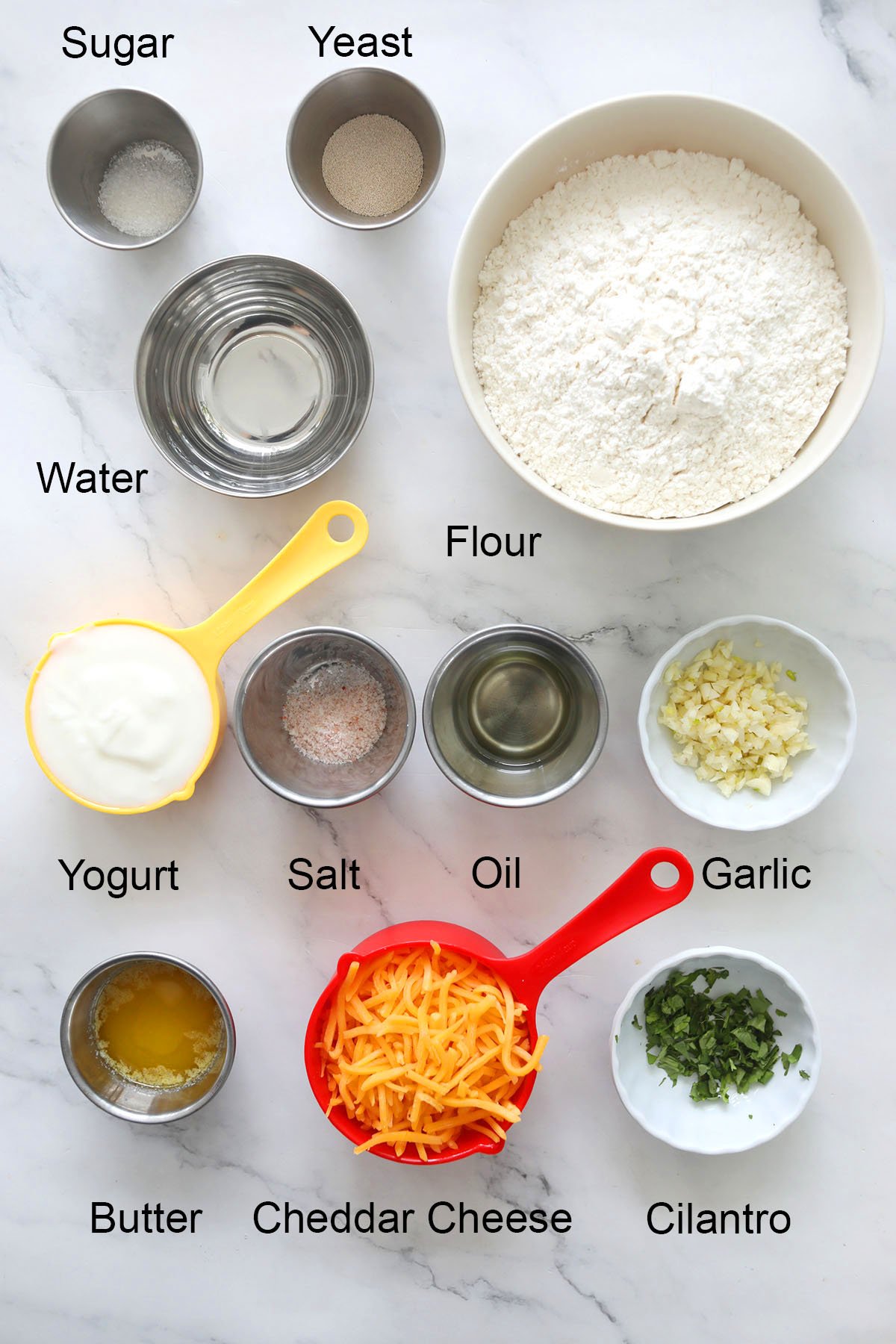 Ingredients for cheesy garlic naan.