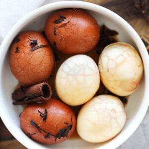 Easy Chinese tea eggs in a bowl, marbled hard boiled eggs.