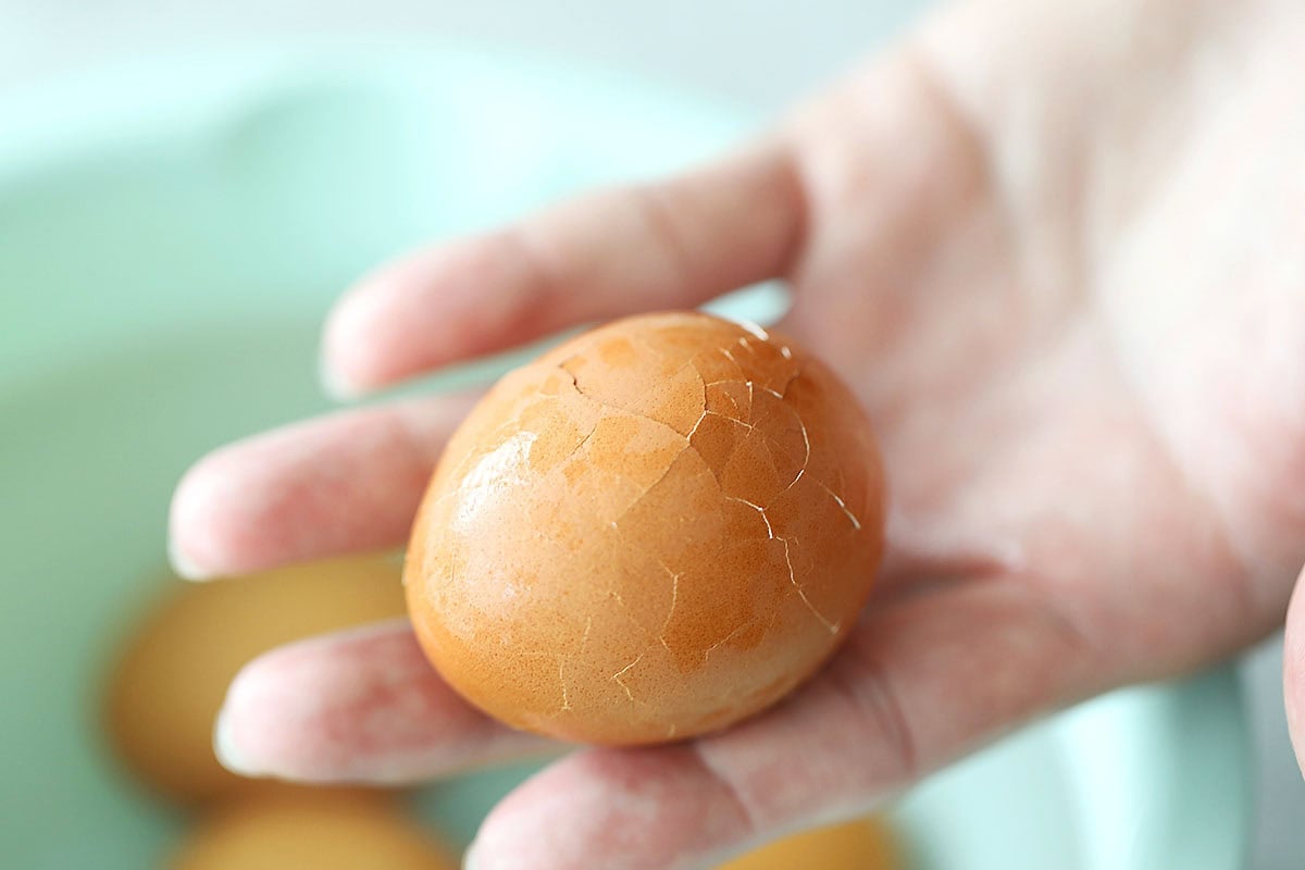 Hard-boiled egg with cracks on the shell.