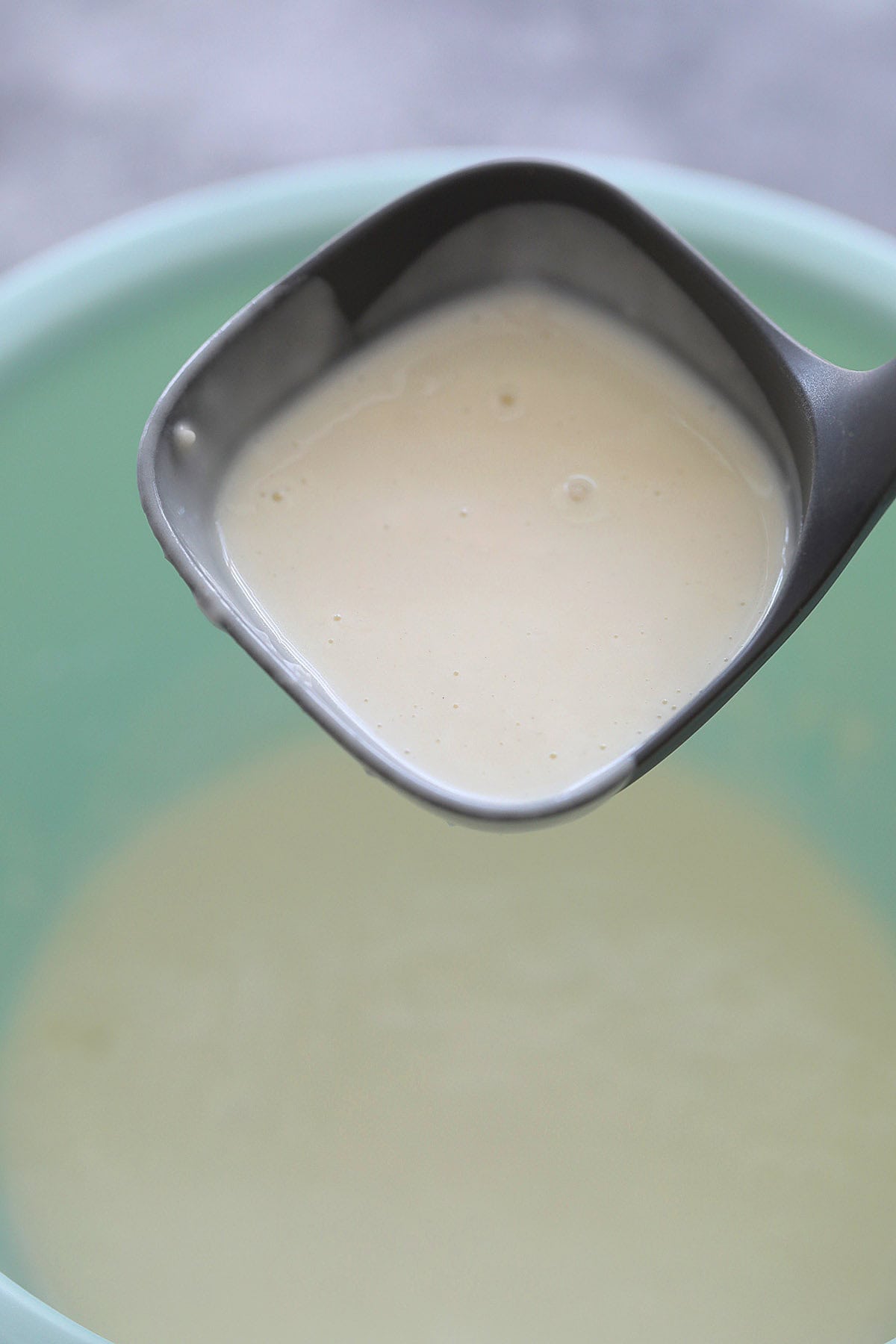 Ladle with easy all purpose frying batter.