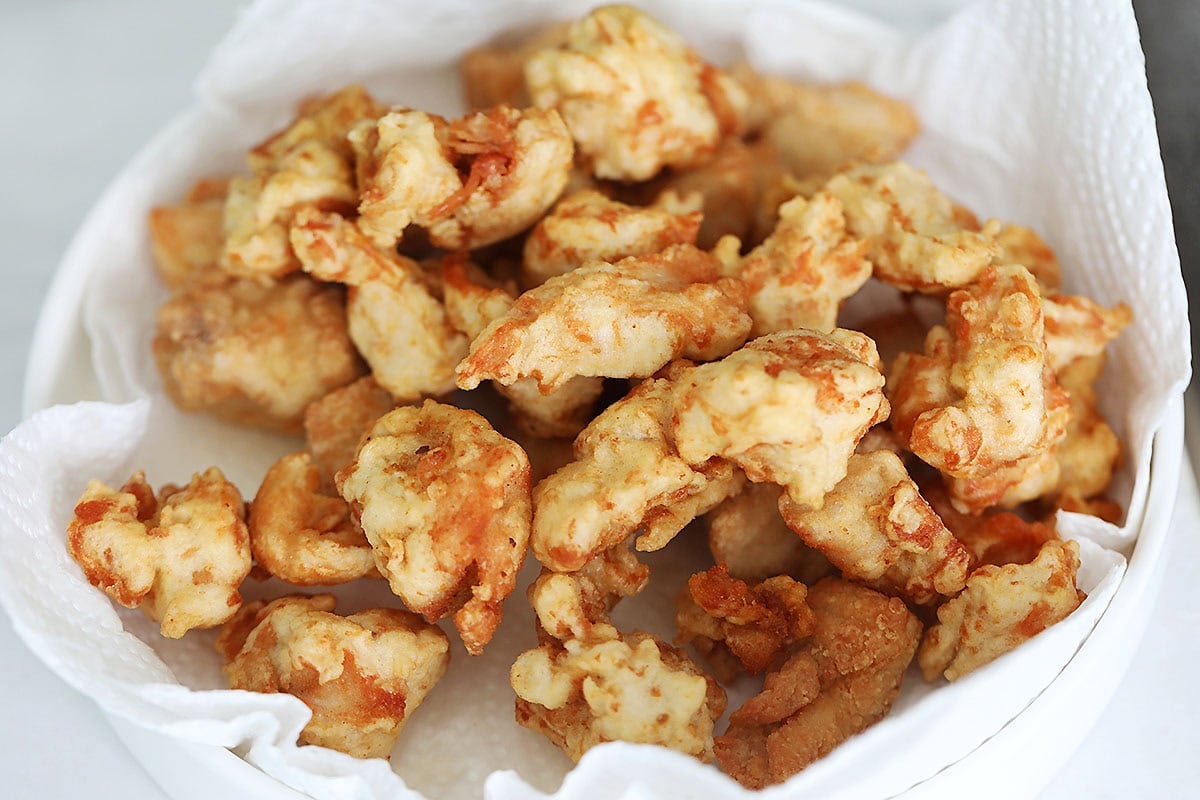 Crispy fried chicken on a paper towel.