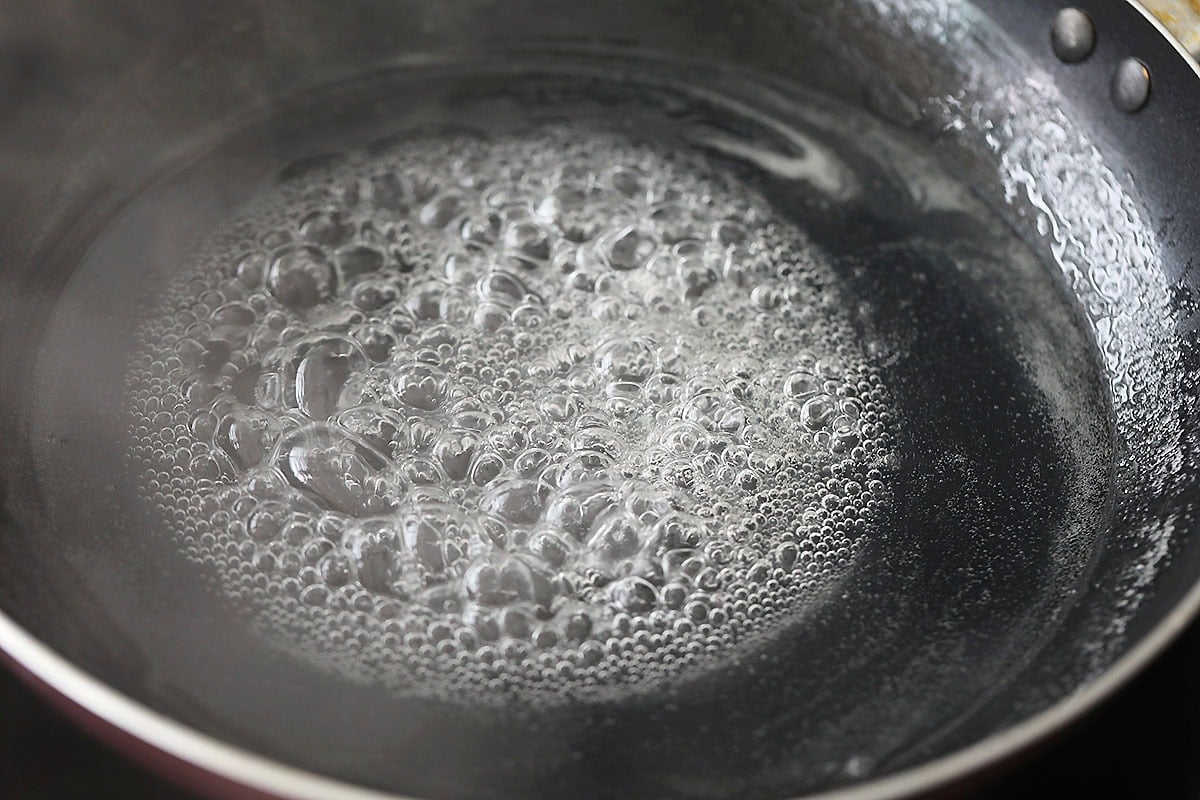 Lemon sauce in a skillet.