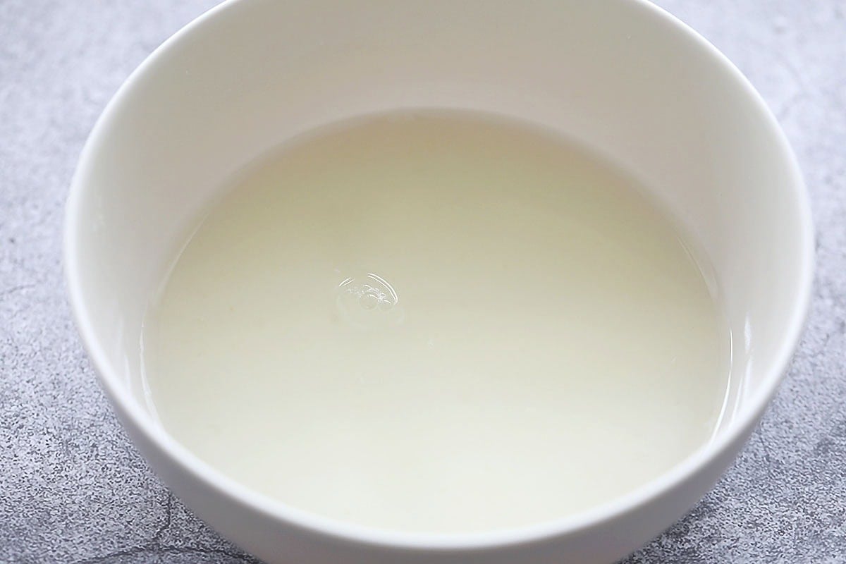 Ingredients for homemade lemon sauce in a bowl.