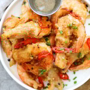 Chinese salt and pepper shrimp served on a plate.