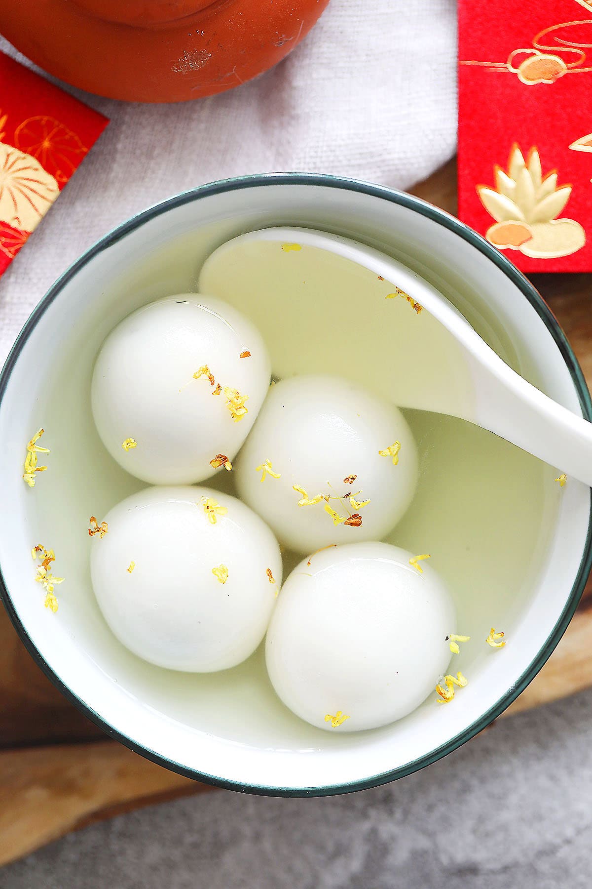 Easy Chinese black sesame mochi tang yuan in ginger syrup.