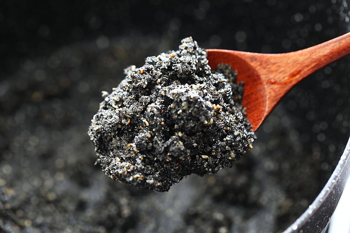 A spoonful of sweet black sesame filling.