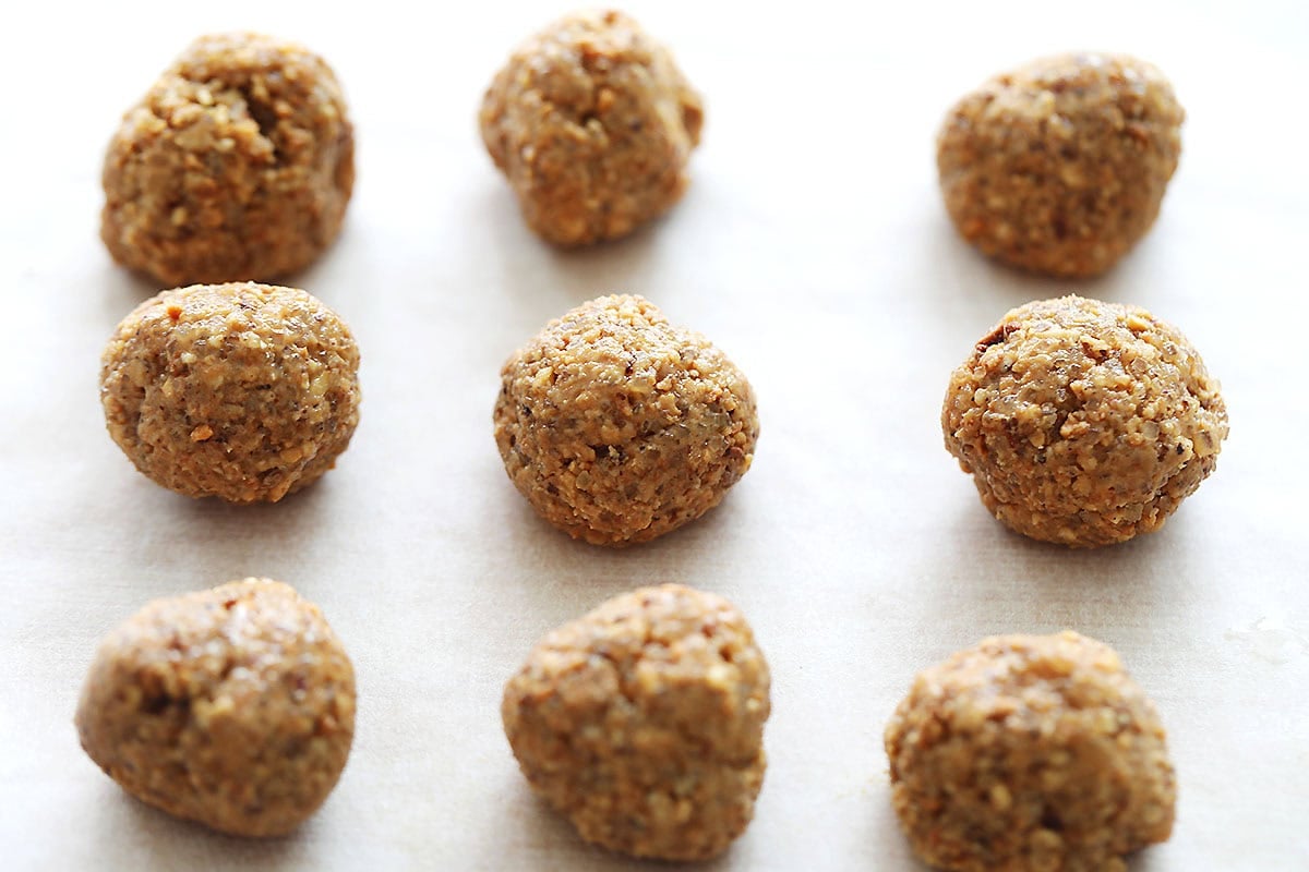 Portioned peanut filling on parchment paper.