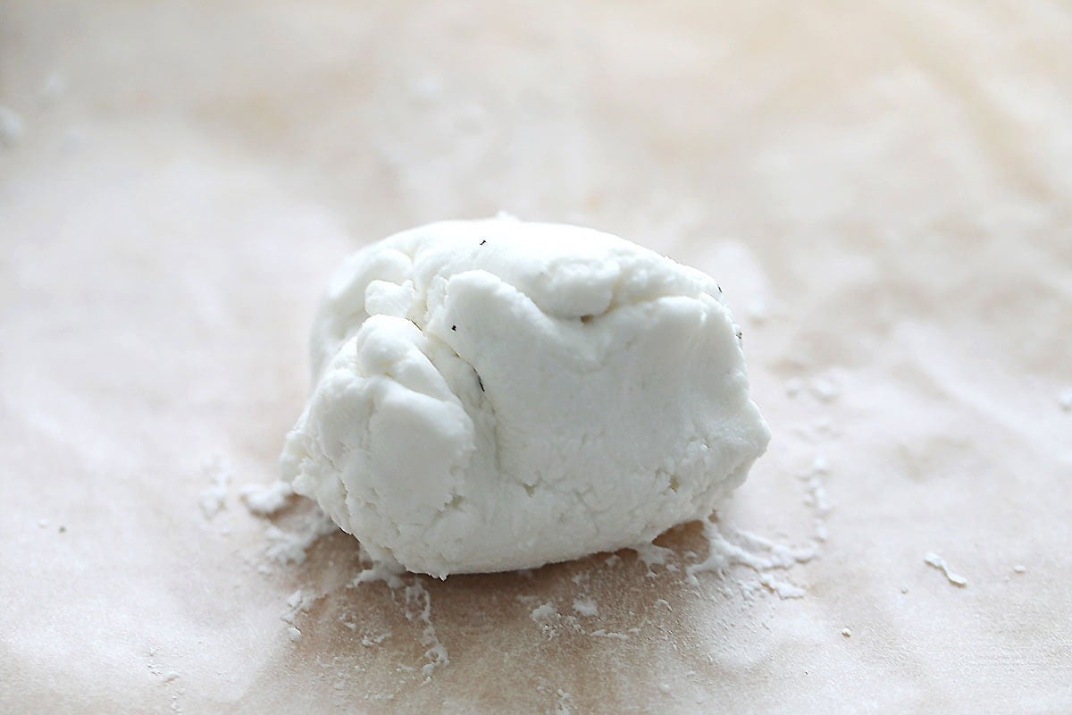 Sealed glutinous rice dough with peanut filling in the center.