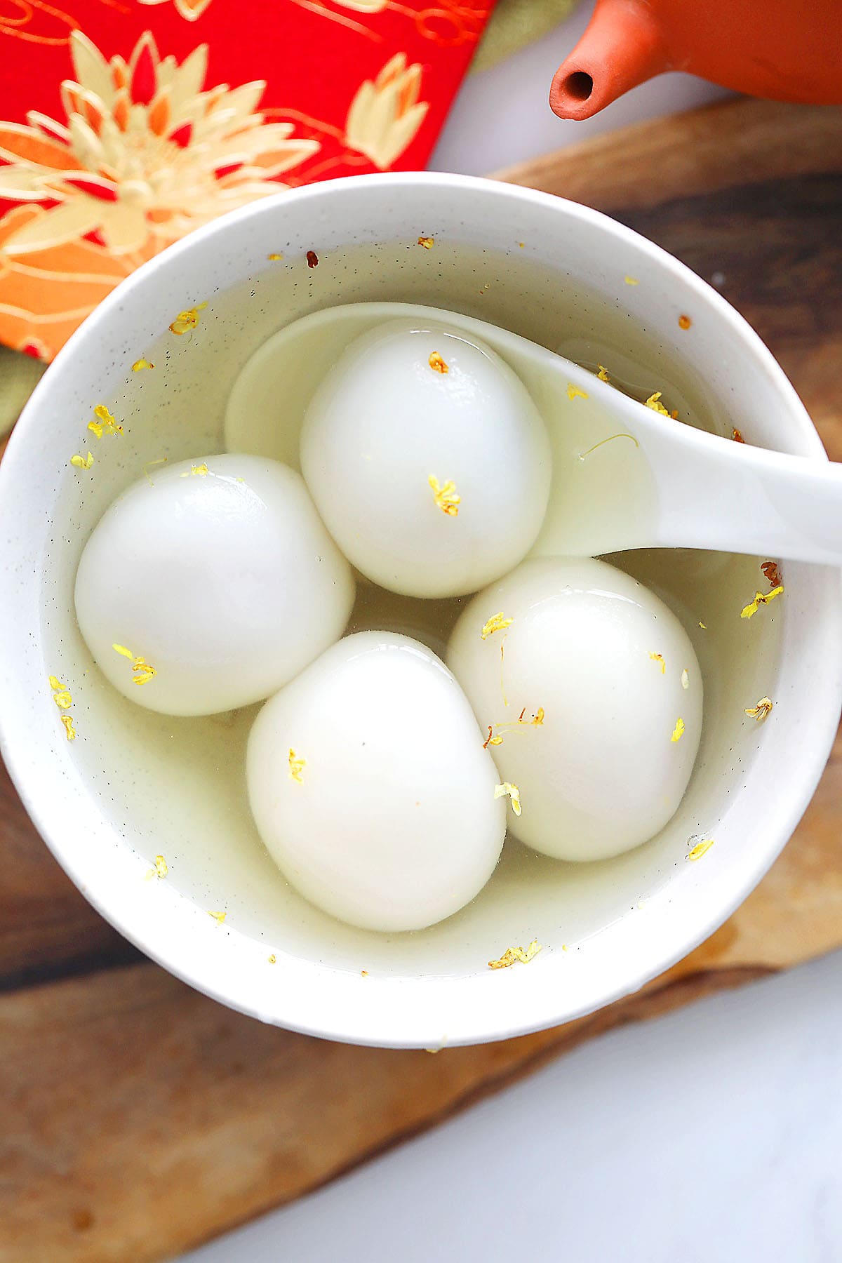 Peanut dumplings served in sweet ginger soup.