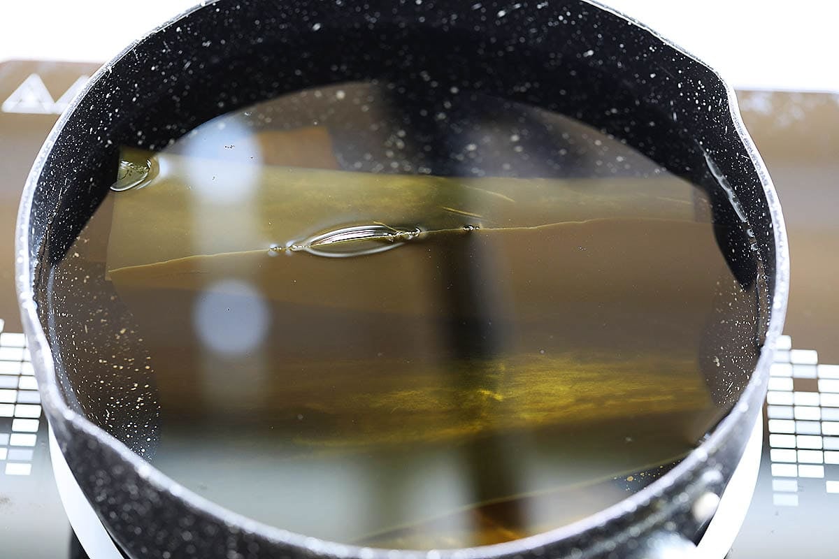 Kombu steeped in a pot of water.