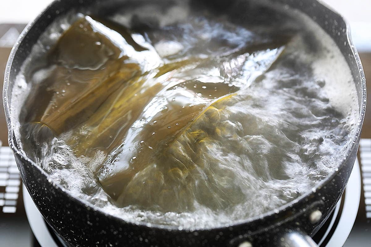 Kombu boiled in a pot of water.
