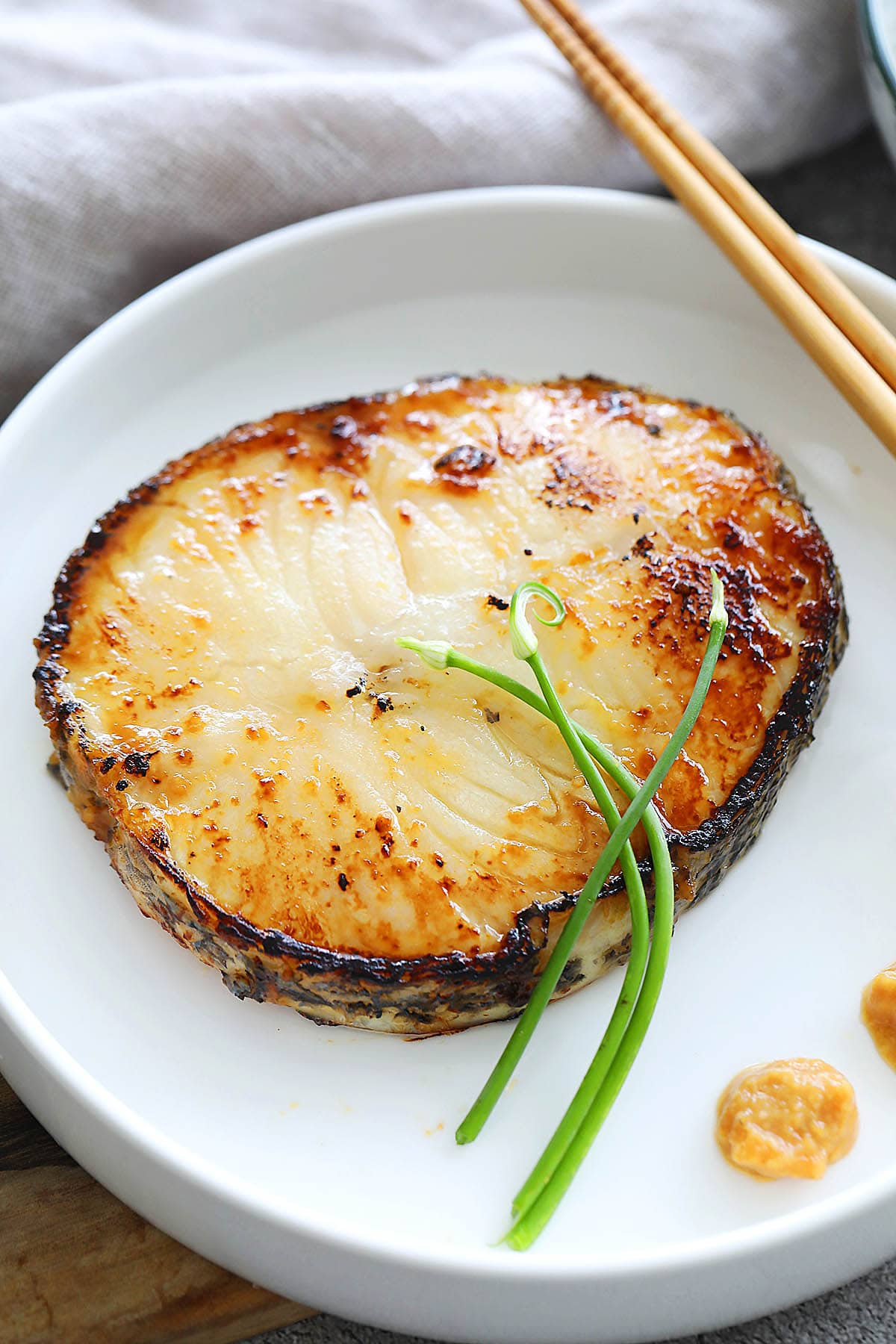 Miso glazed cod served on a plate.