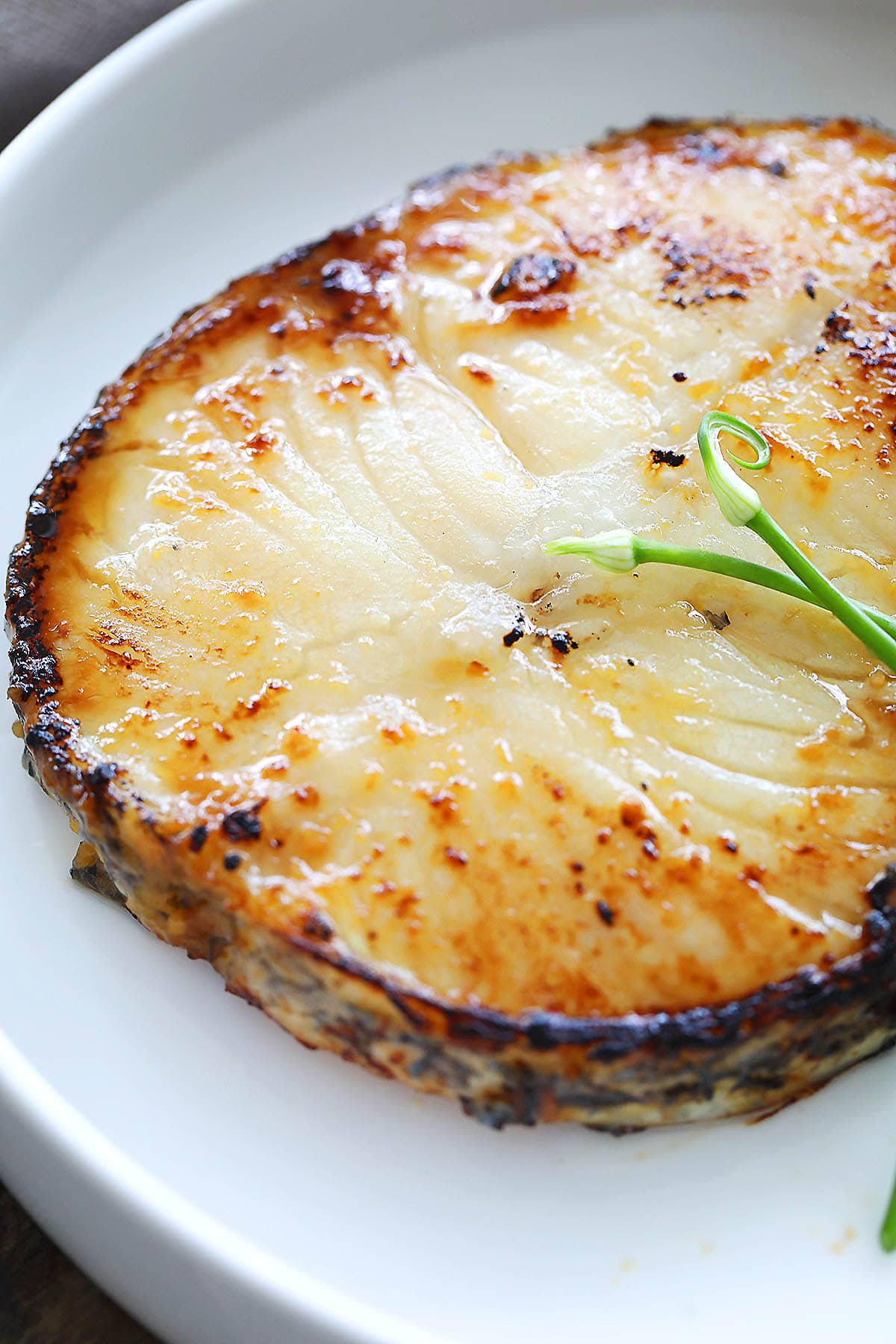 Buttery and flaky Nobu style miso cod served on a plate.