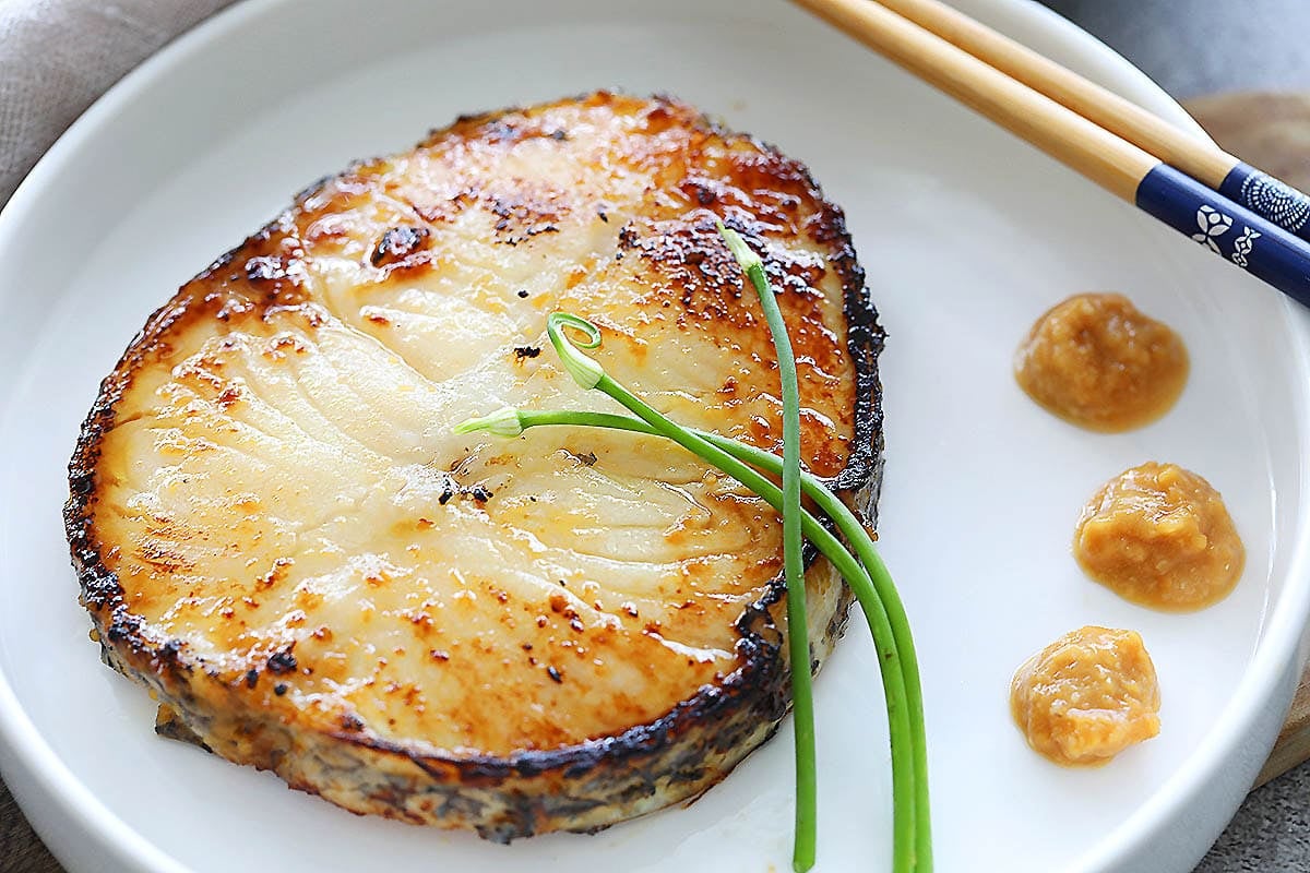 Japanese miso glazed cod served on plate.