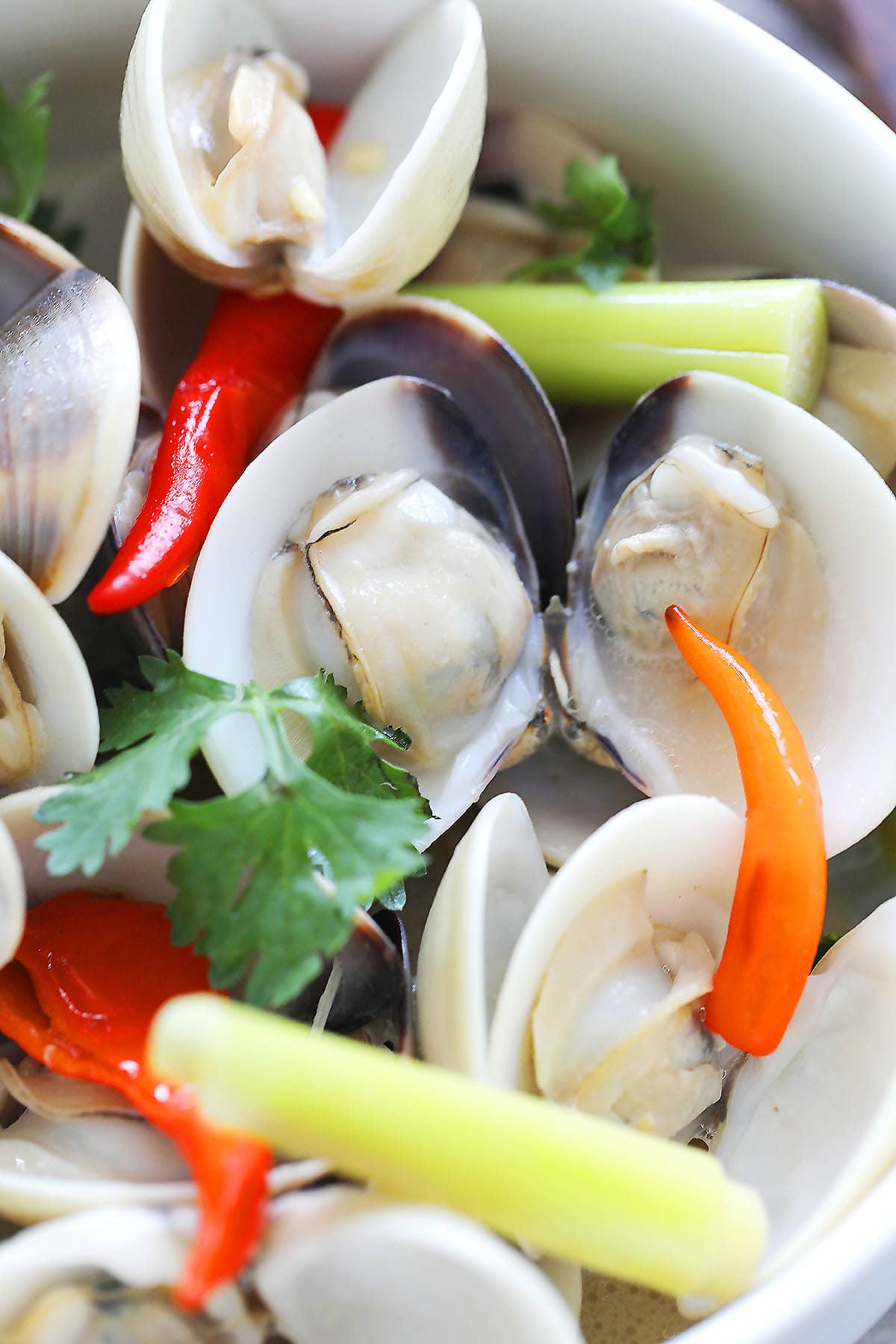 Thai style clams served in a bowl.
