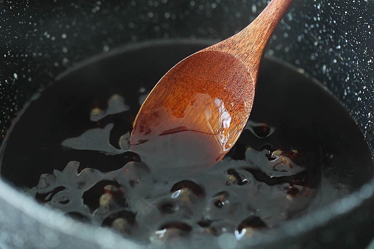 Sauce bubbling in a saucepan.