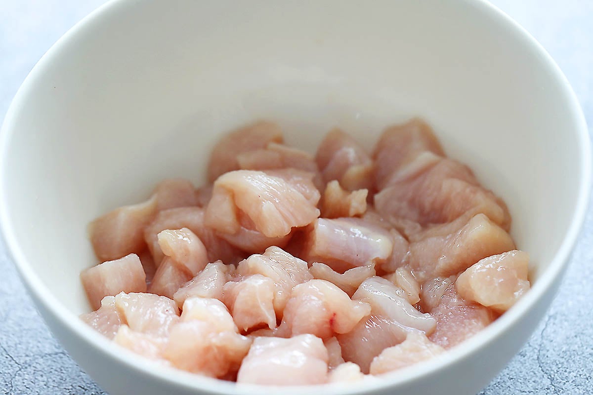Marinated chicken in a bowl.