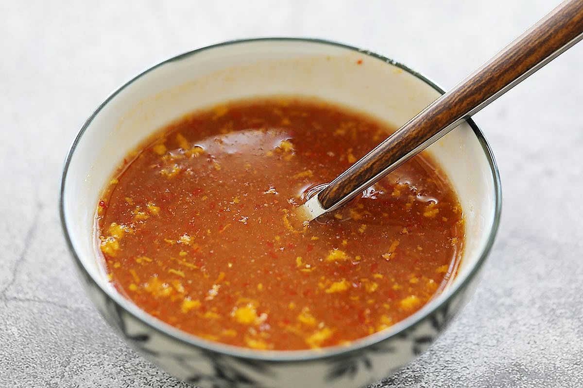 Homemade orange sauce in a bowl.