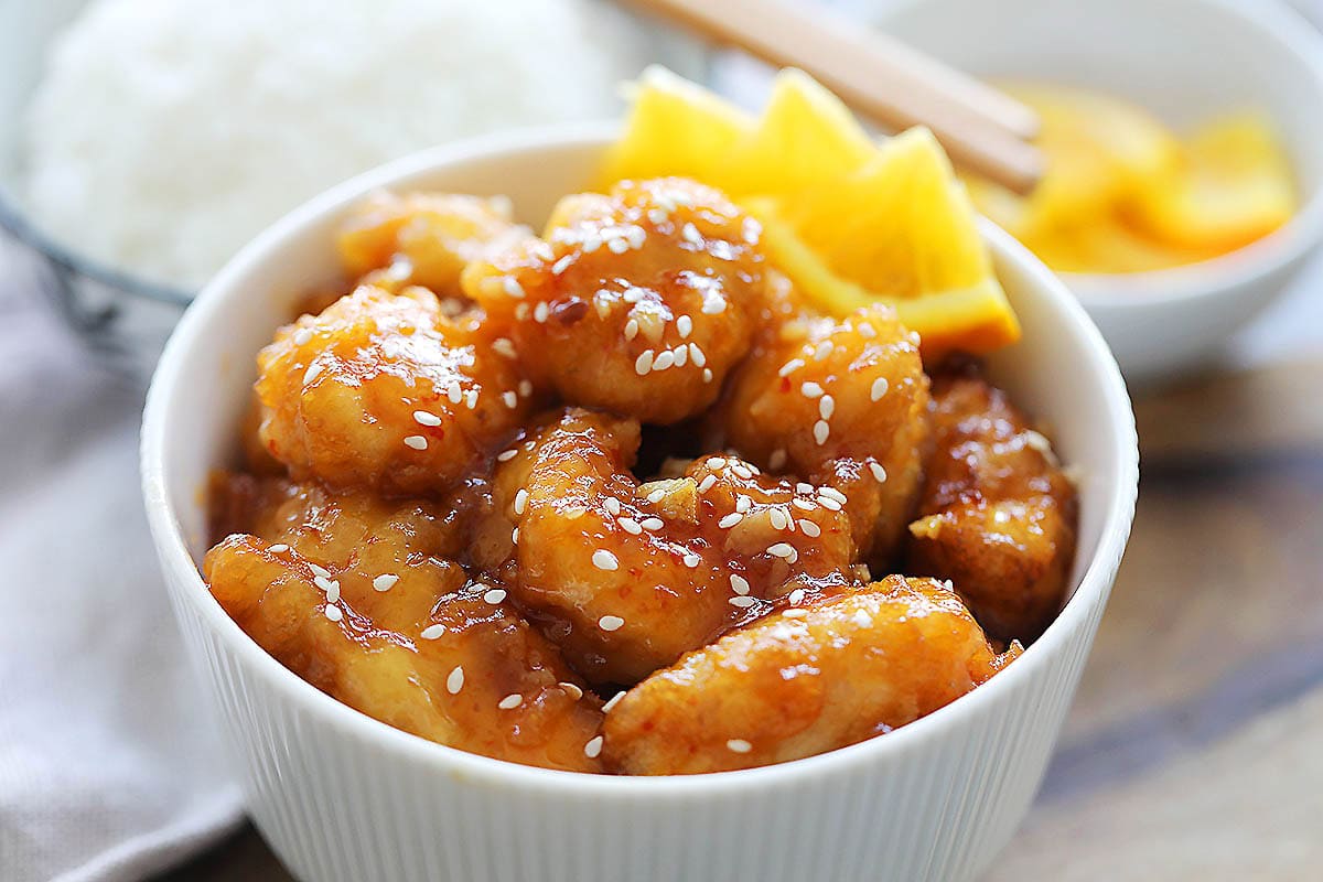 Easy orange chicken recipe with homemade orange sauce served in a bowl.