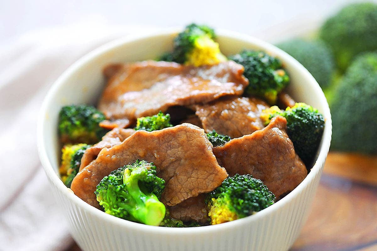 Chinese beef and broccoli served in a bowl.