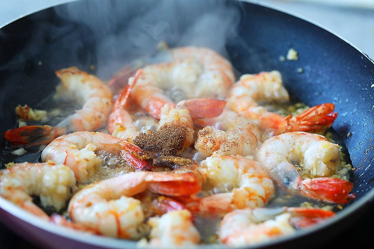 Shrimp in honey lime sauce in a skillet.
