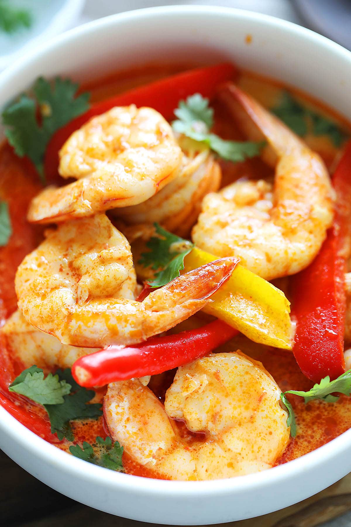 Thai red curry shrimp with bell peppers.
