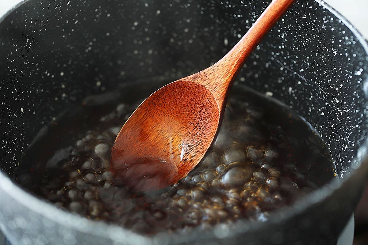 Homemade teriyaki sauce in a saucepan.