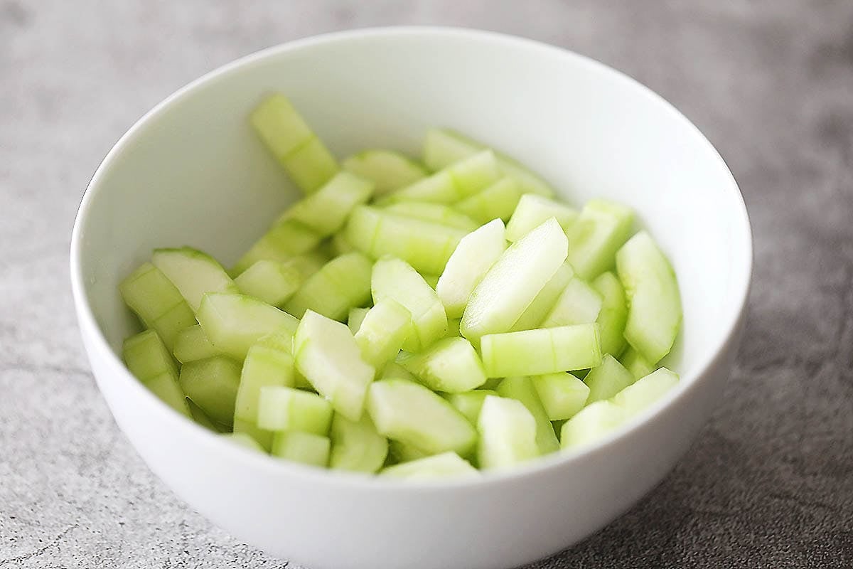 Cucumber pieces in a bowl.