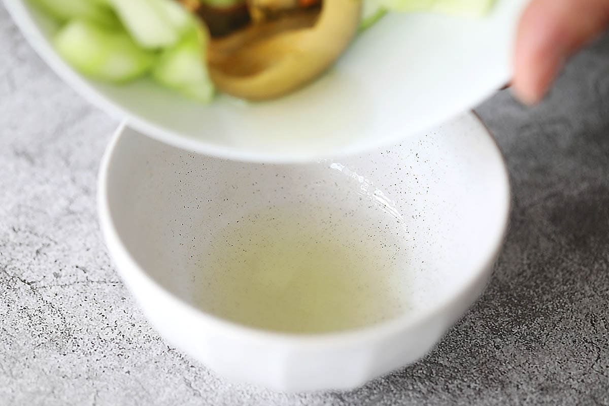 Salt water in a small bowl.