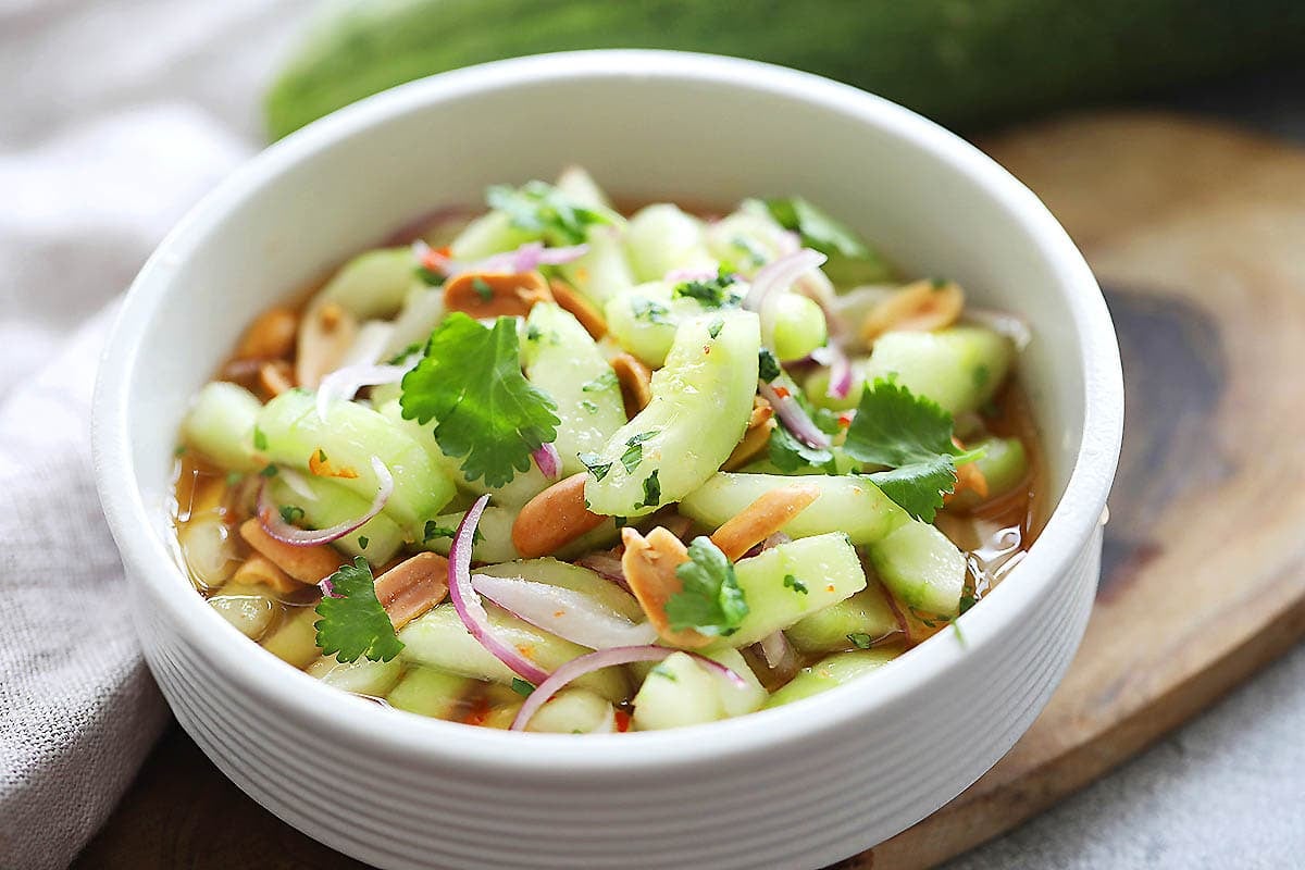 Authentic Thai cucumber salad recipe in a bowl.