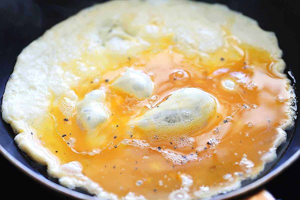 Egg mixture in a skillet.