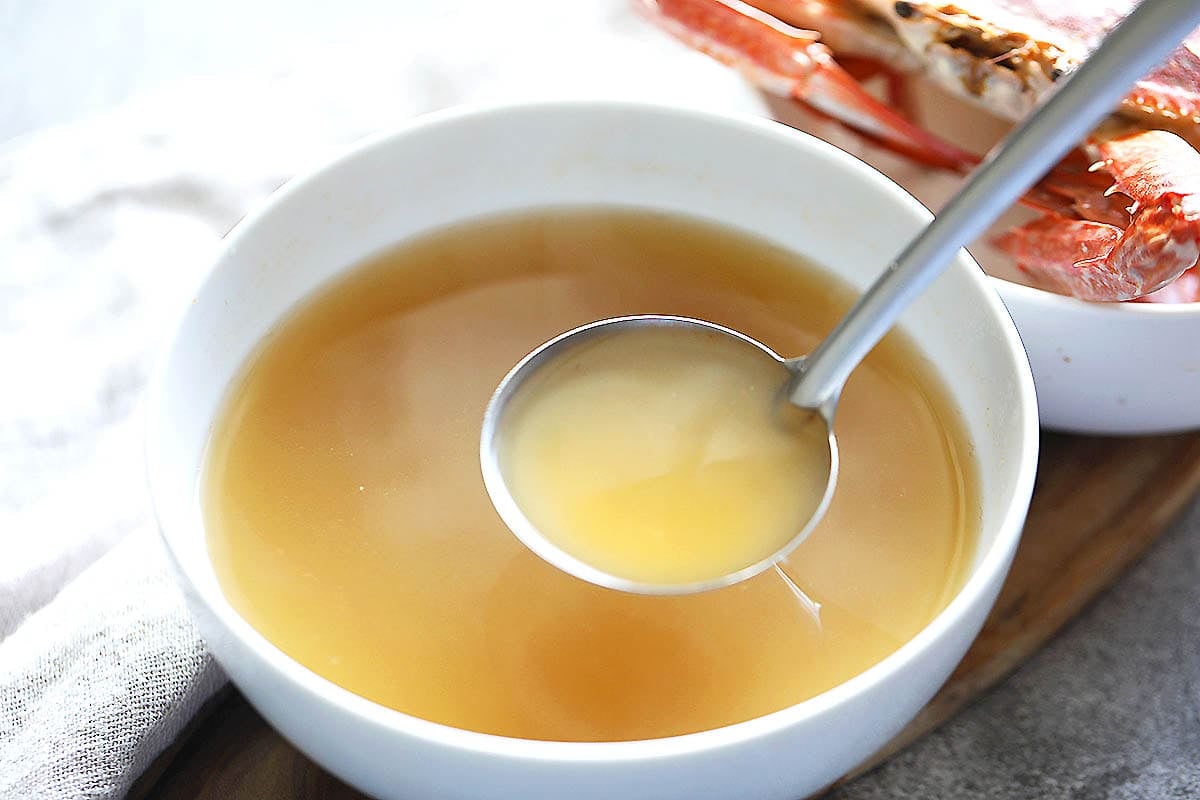 Seafood stock in a bowl.