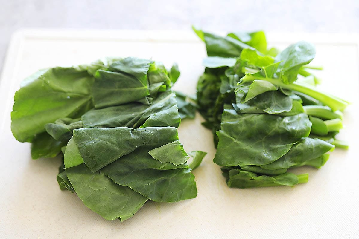Gai lan sliced into half.