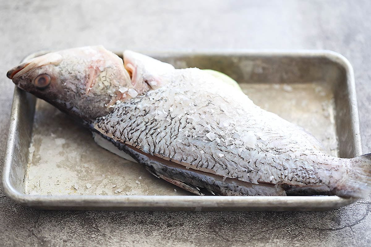 Seabass sprinkled with sea salt flakes.