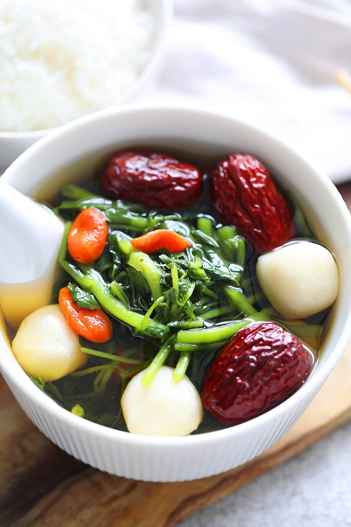 Cantonese watercress soup with fish balls, served in a bowl.