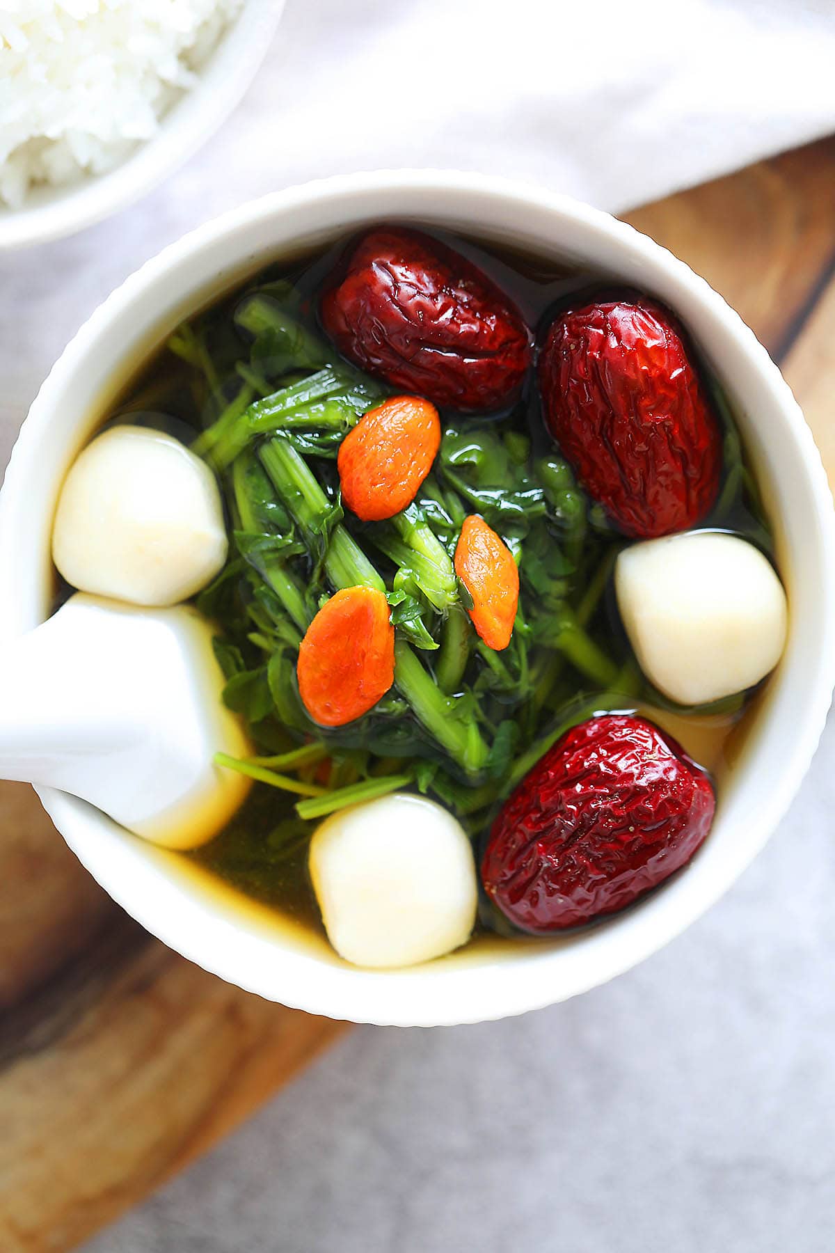 Chinese style watercress soup served in a bowl.