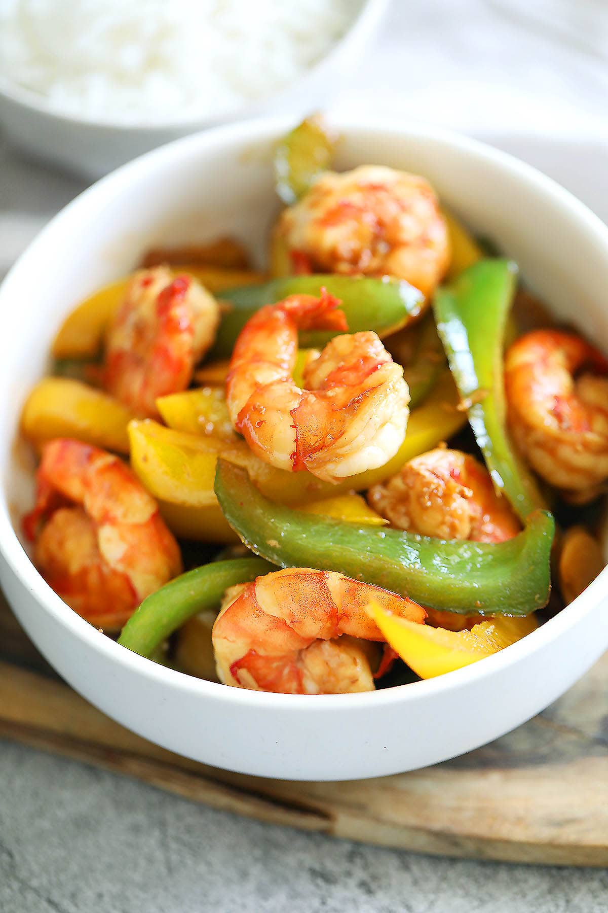 Bell pepper shrimp stir fry served in a bowl.