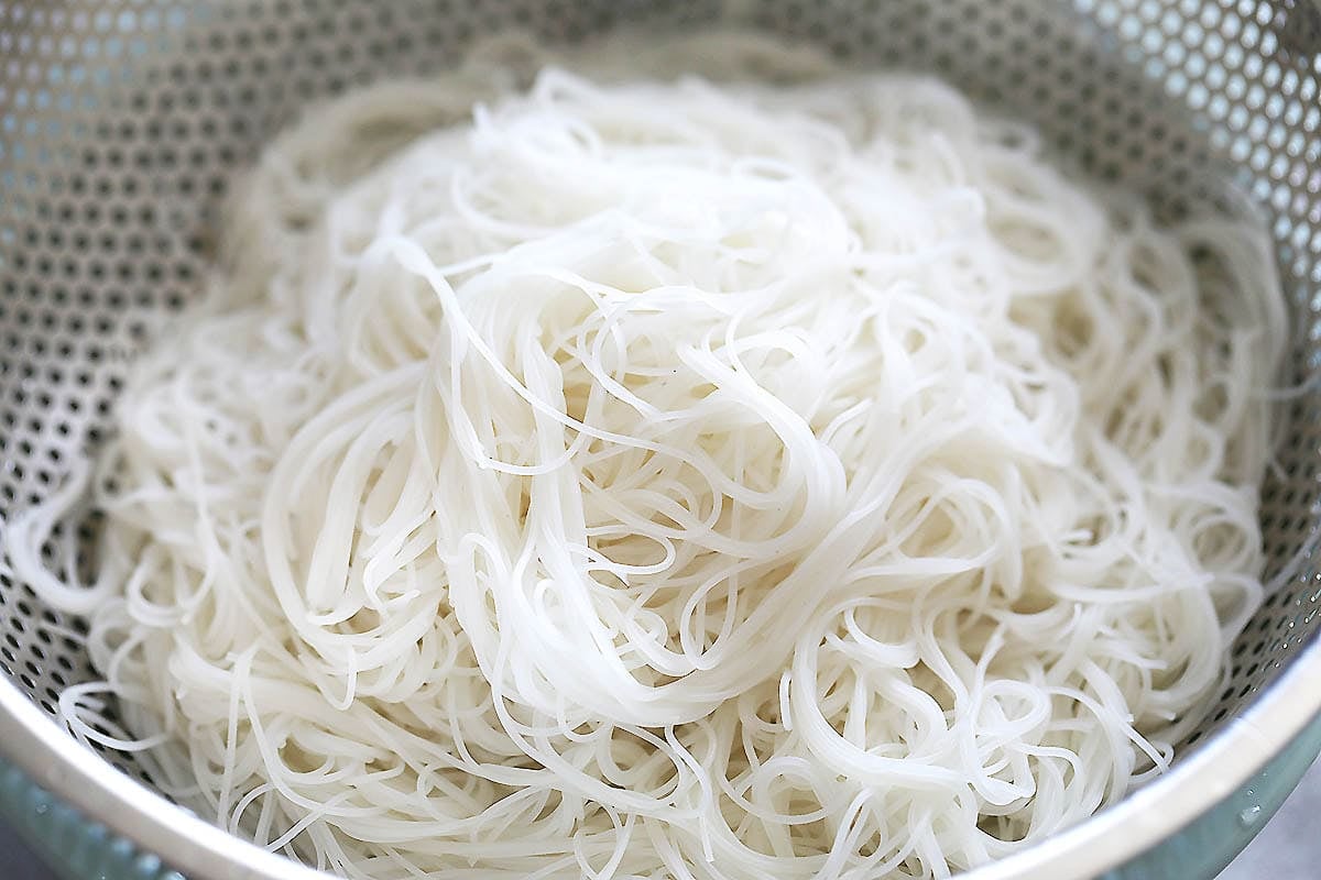 Drained vermicelli in a colander.