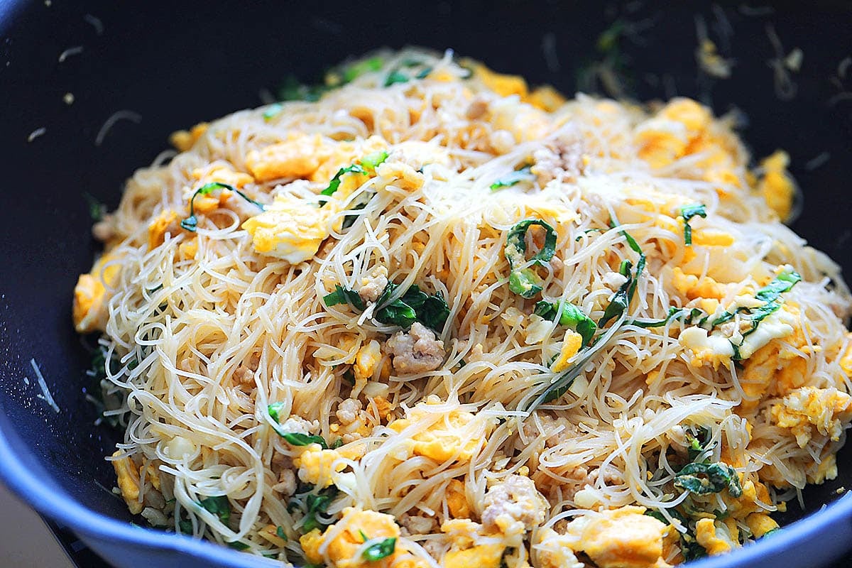 Chinese egg fried noodles recipe with ground pork and gai lan.