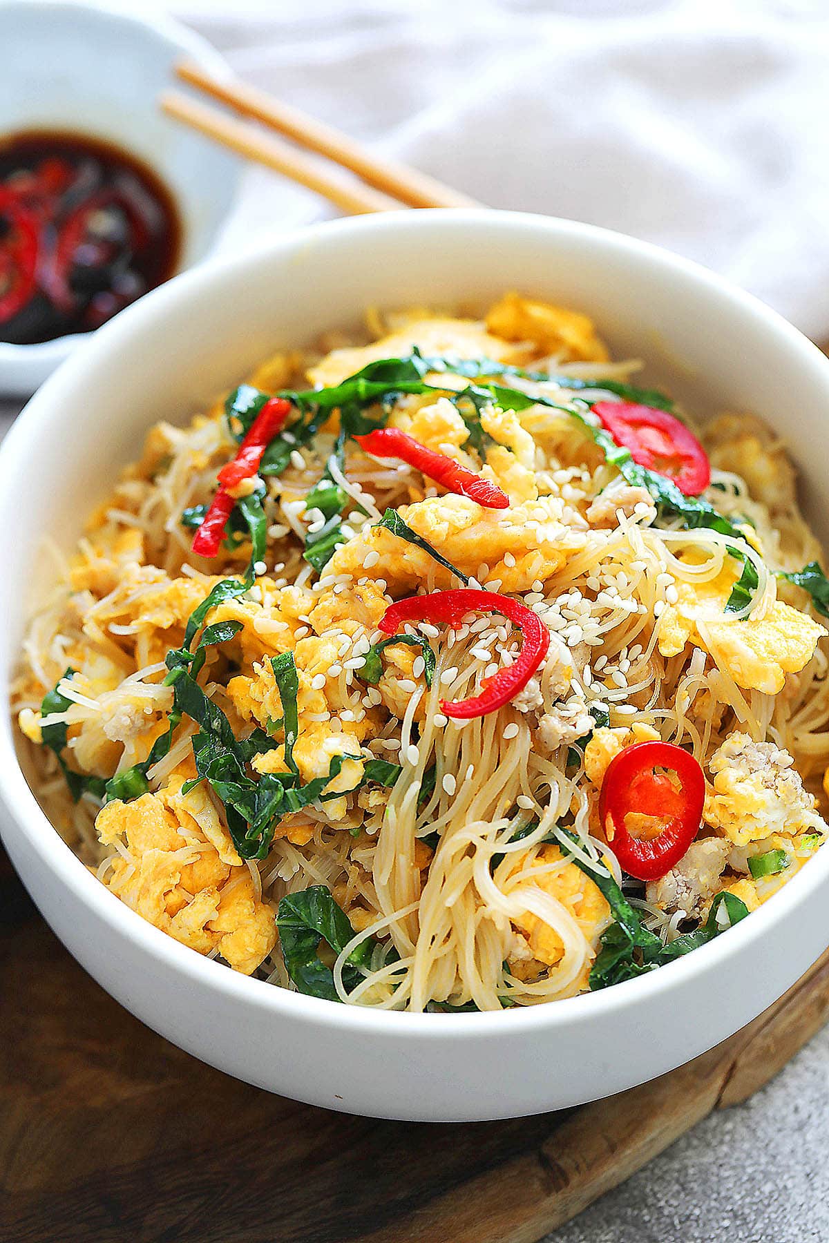 Egg fried noodles stir fry with gai lan and ground pork.
