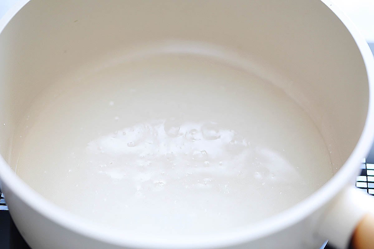 Sugar and water in a saucepan.