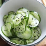 Easy Japanese cucumber salad recipe with rice vinegar served in a bowl.