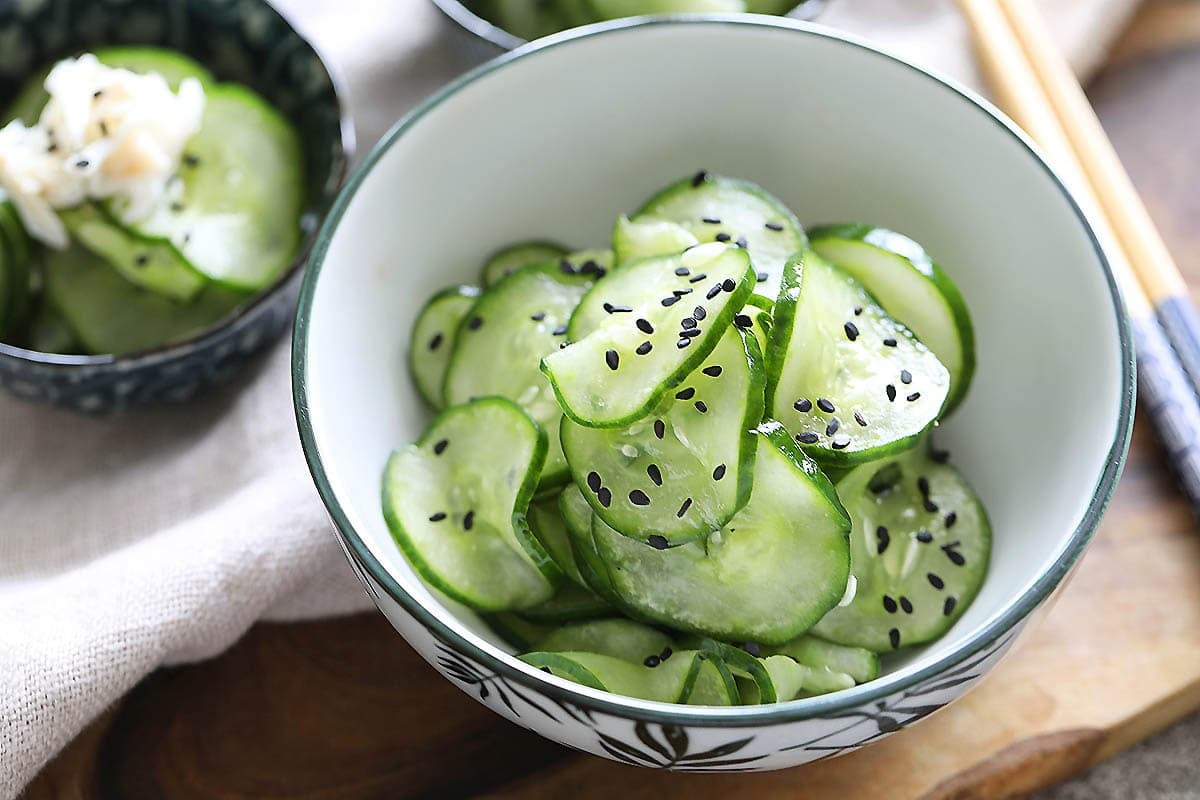 The best Japanese cucumber salad recipe with rice vinegar and sesame oil served in a bowl.