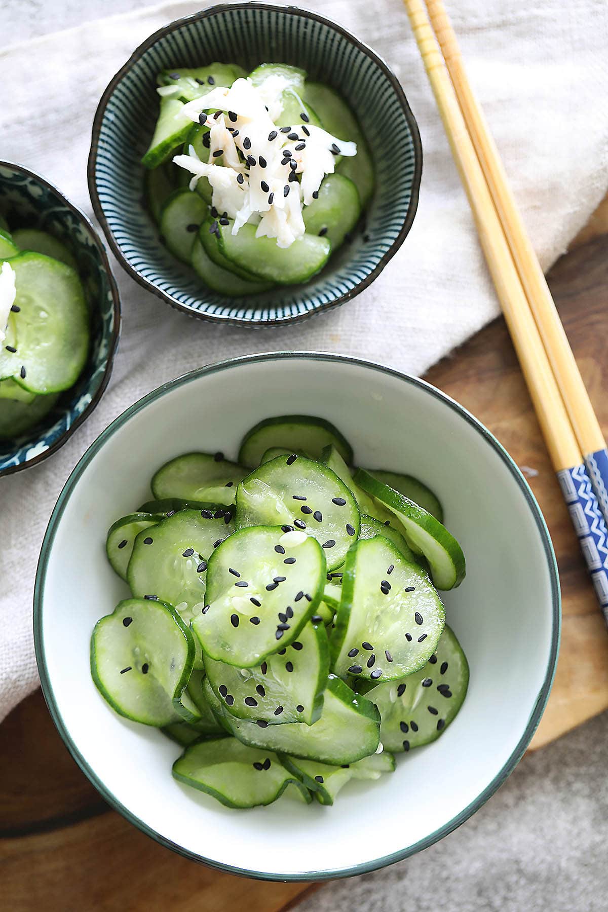 Traditional Japanese cucumber salad (Sunomono) garnished with sesame seeds.