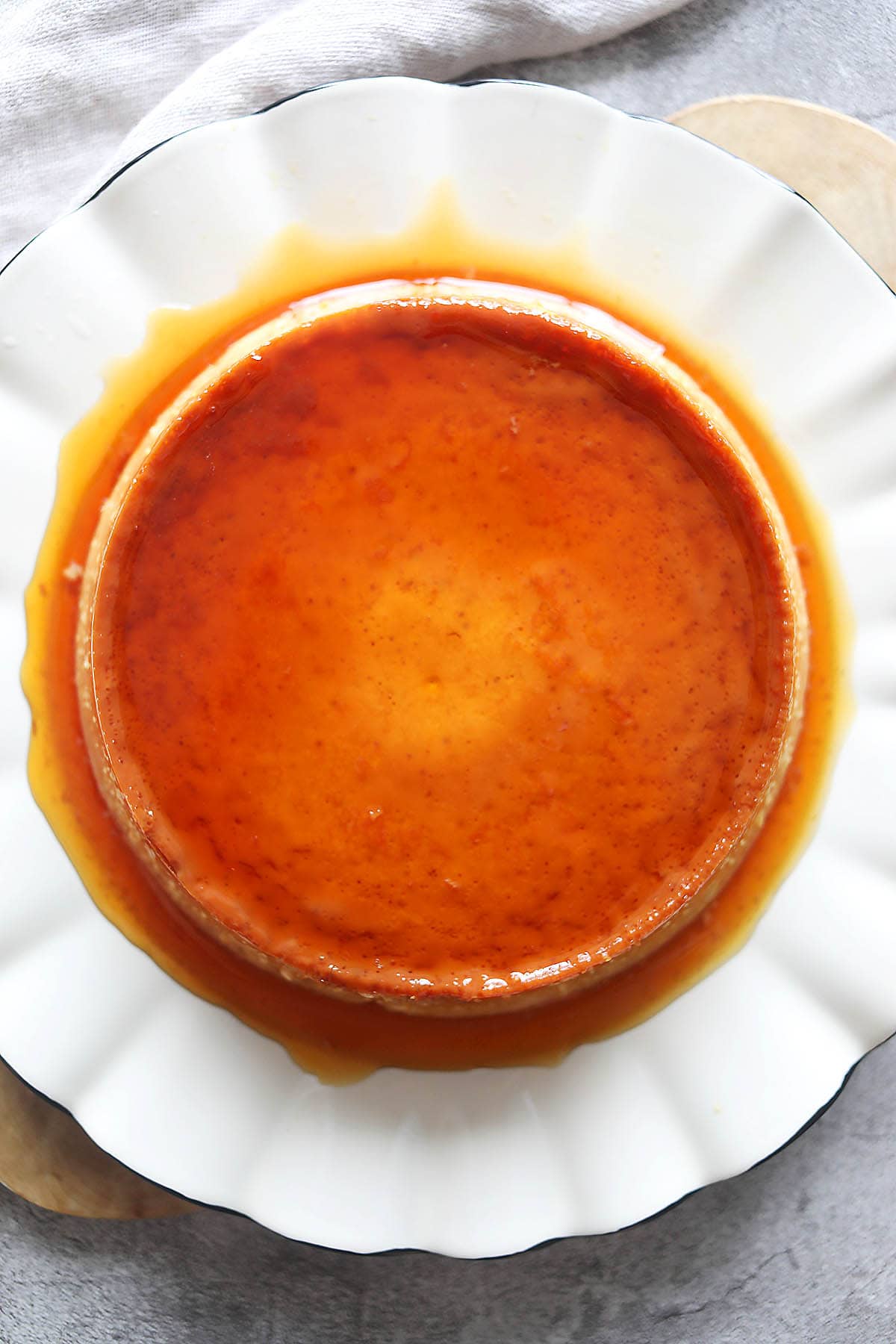 Venezuelan flan on a serving plate.