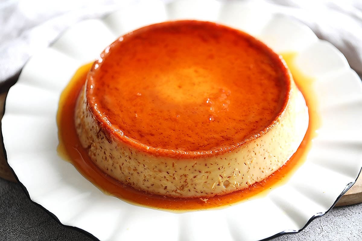 Homemade Venezuelan flan (quesillo) on a serving plate.