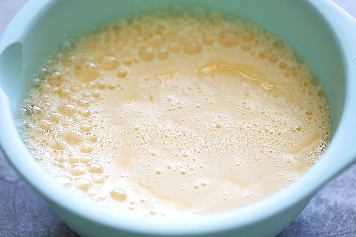 Custard mixture in a large bowl.