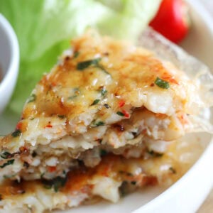 A stack of Vietnamese shrimp cakes on a plate.