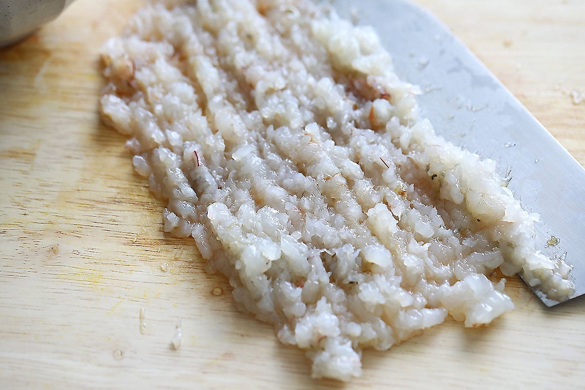 Shrimp paste on a chopping board.