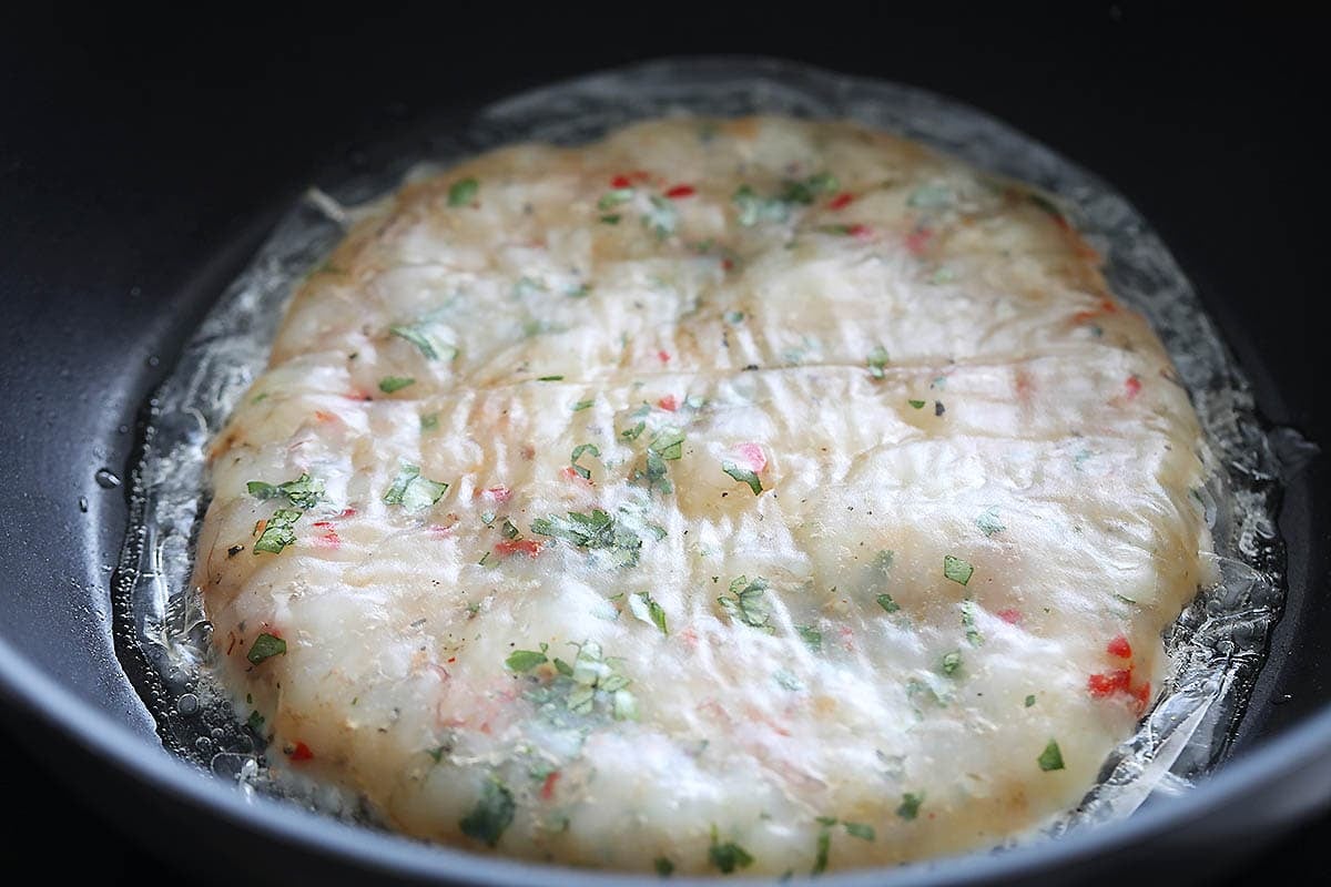 Vietnamese shrimp cake in a pan.